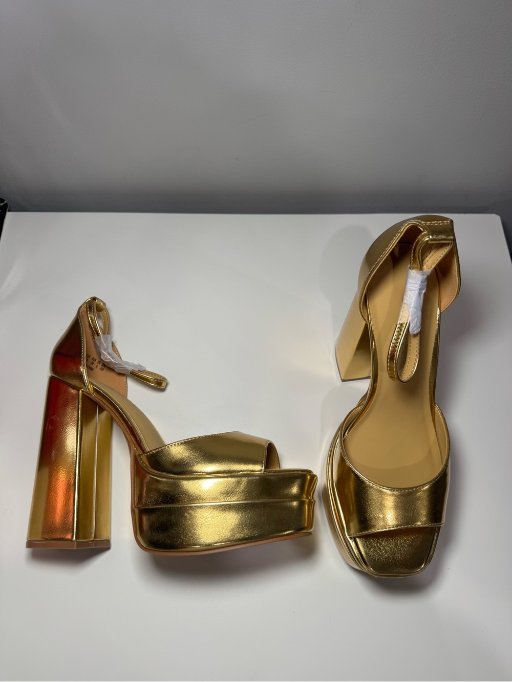 Gold platform heels